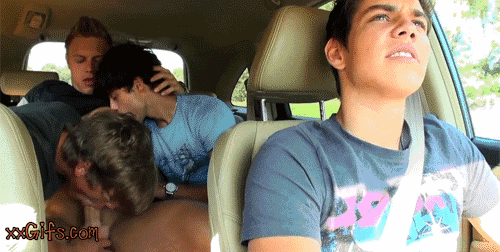 young-guys-having-fun-in-running-car.gif